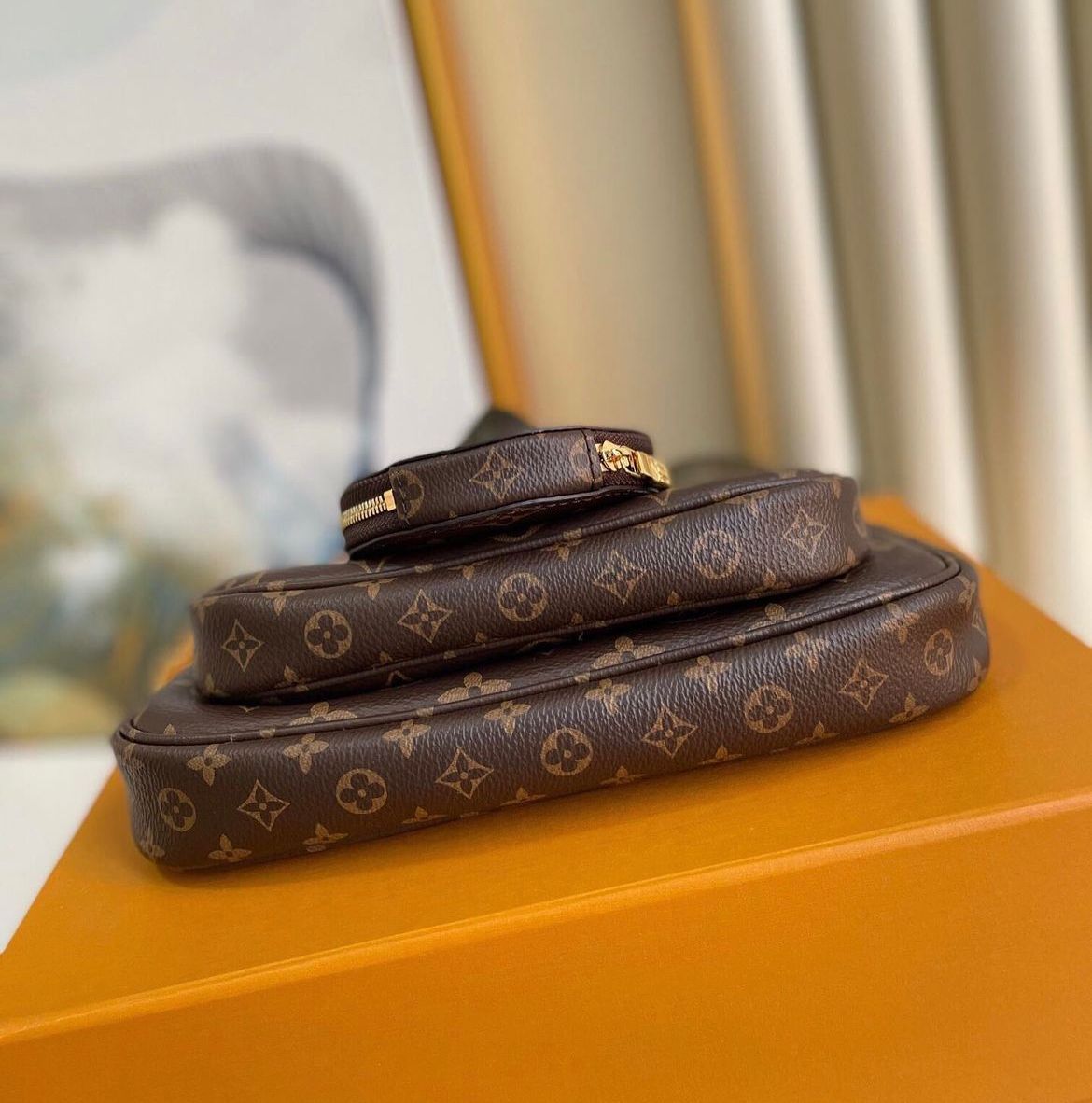 LV MULTI POCHETTE ACCESSOIRES